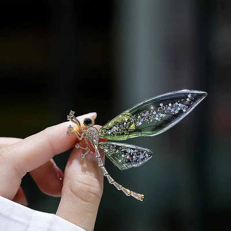 Broche libellule de cristal avec strass
